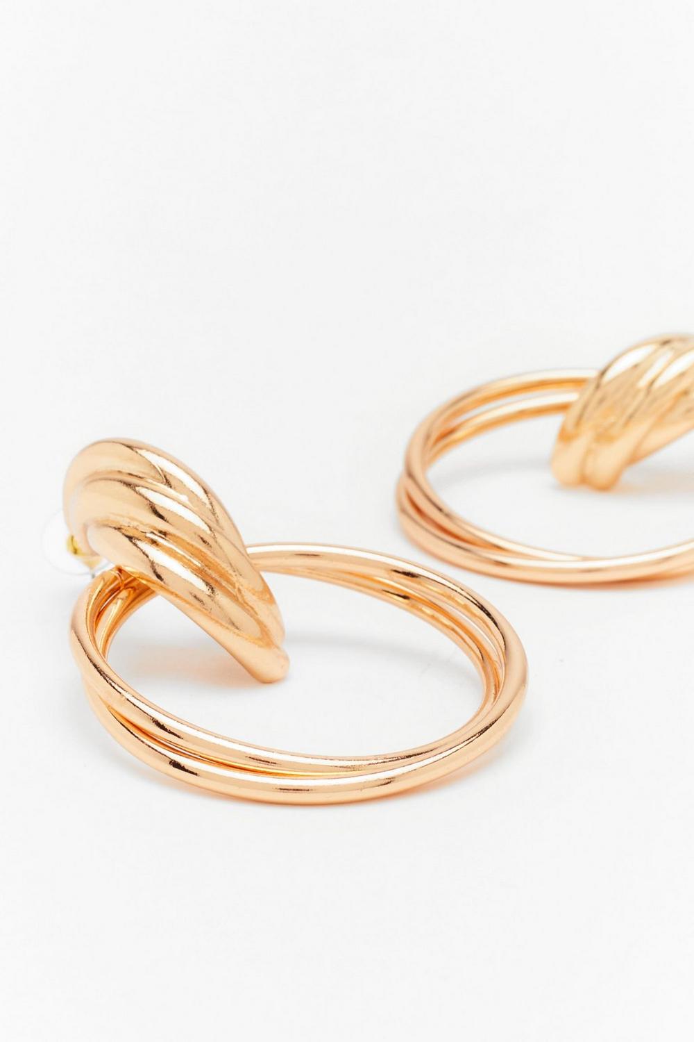 Elegant Gold Twist Earrings